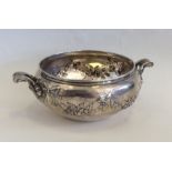 An unusual Continental silver two handled bowl emb