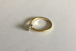 An 18 carat and platinum set diamond single stone