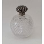 A silver hobnail cut scent bottle of fluted design