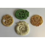 A group of four Chinese hard stone medallions deco