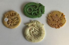 A group of four Chinese hard stone medallions deco