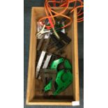 A box containing clamps.