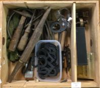 A box containing screwdrivers, planes etc.