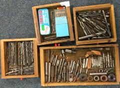 Four drawers of drill pieces.