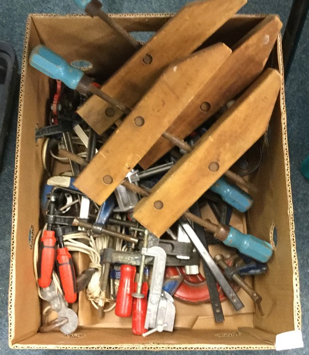 A box containing clamps etc.
