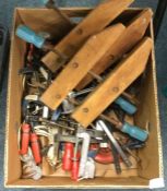 A box containing clamps etc.