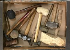 A box containing mallets, hammers etc.