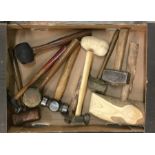 A box containing mallets, hammers etc.