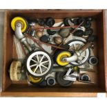A box containing trolley wheels etc.