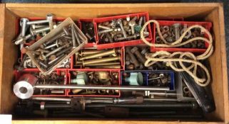A box containing bolts and fixings.