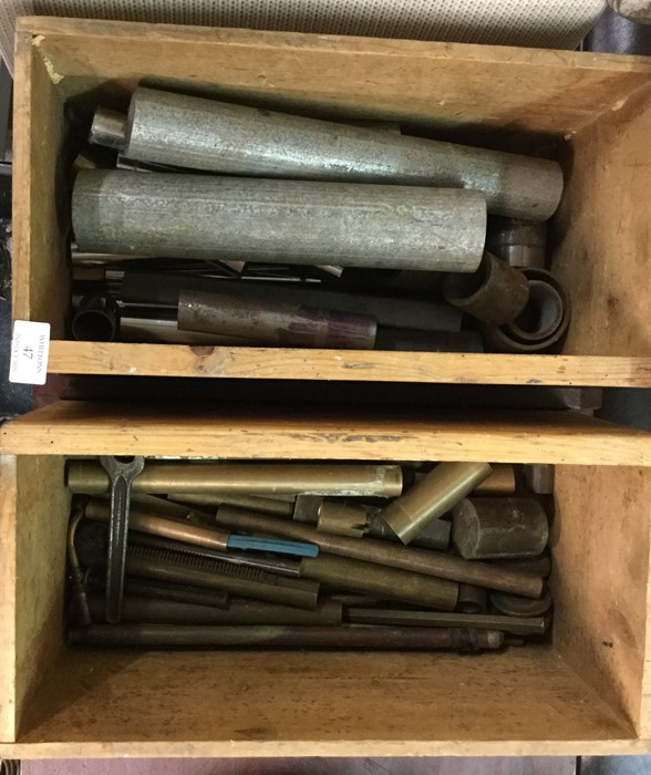A quantity of metal lathe tubes.