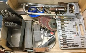 A box containing metalwork tools.