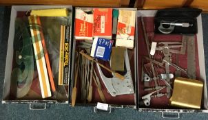 Three trays of measures, staplers etc.