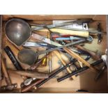 A box containing hammers and other tools.