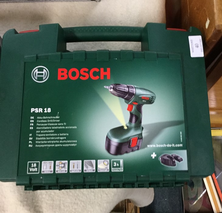 A Bosch drill driver.