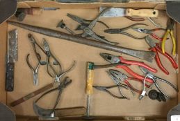 A box containing pliers and wire cutters.