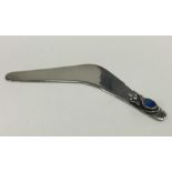 A novelty Australian silver model of a boomerang i