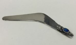 A novelty Australian silver model of a boomerang i