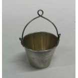 A Russian silver tea strainer with gilt interior t