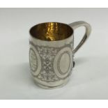 A fine quality Victorian silver christening mug wi