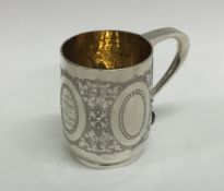 A fine quality Victorian silver christening mug wi