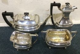 A heavy silver four piece tea service with gadroon