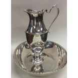 A rare Russian silver ewer and basin with shaped b