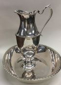 A rare Russian silver ewer and basin with shaped b