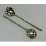 A pair of Russian silver gilt spoons with twisted