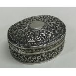 A large dome top Islamic silver box decorated with