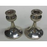 A pair of tapering silver dwarf candlesticks. Birm