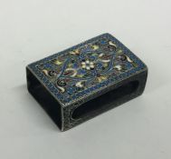 A Russian silver and enamelled matchbox case decor