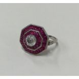 A large brilliant cut single stone ring with ruby