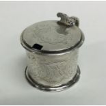 A Victorian silver hinged top mustard pot. London