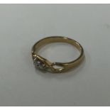 A 9 carat yellow stone ring with pierced mount. Ap