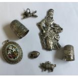 Two silver thimbles together with silver fobs etc.