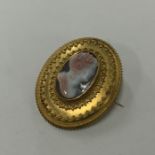 A hardstone cameo depicting a lady in relief with