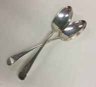 A pair of Georgian silver bright cut dessert spoon