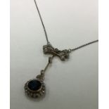 An attractive Victorian sapphire and diamond penda