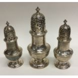 A good set of three Georgian silver sugar casters.