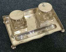 A heavy silver inkstand on ball feet. Chester. App