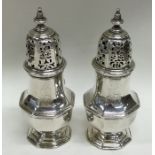 A good pair of octagonal silver casters. London 17
