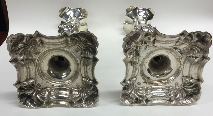 A good pair of George II cast silver candlesticks - Image 2 of 3