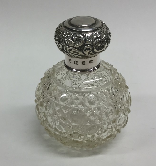 A silver and hobnail cut scent bottle. Est. £25 -