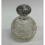 A silver and hobnail cut scent bottle. Est. £25 -