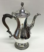 A fine quality George II silver coffee pot with cr