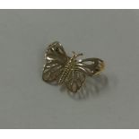A 9 carat brooch in the form of a butterfly. Appro
