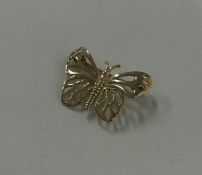 A 9 carat brooch in the form of a butterfly. Appro