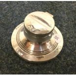 A circular silver capstan shaped inkstand with hin