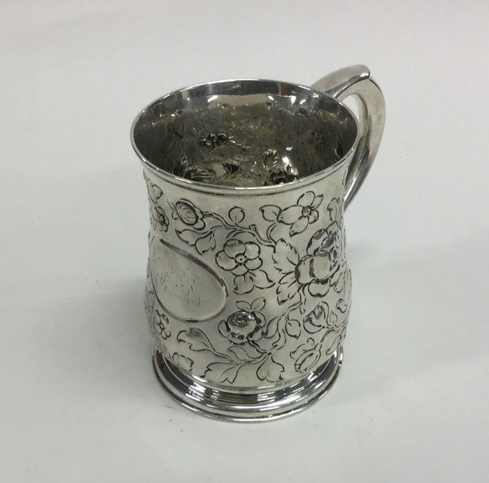 A Victorian silver embossed mug with floral decora - Image 2 of 2